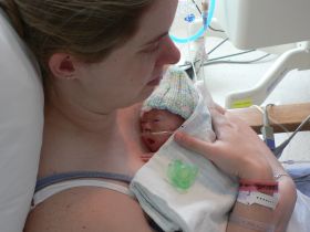 July 28/06 - Leah holding Isabel