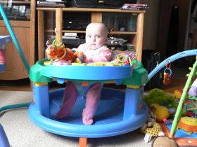 Mar 25/07 - Isabel in her exersaucer