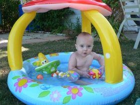 Aug 13/07 - Isabel playing in Grandma's kiddy pool