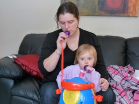Dec 18/08 - Isabel singing with mommy